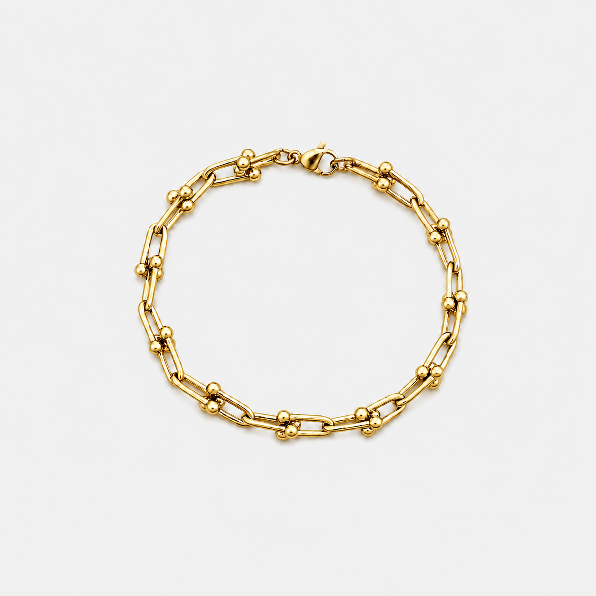 ACULA Shark Link Bracelet in gold